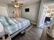 Main bedroom with king bed, private balcony access, and coastal decor at 6001 - 1191 S Kings Hwy., Myrtle Beach, SC 29575