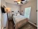Cozy bedroom with a queen bed and ceiling fan at 6001 - 1191 S Kings Hwy., Myrtle Beach, SC 29575