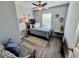 Bedroom with twin-size bed, window seating, and coastal decor at 6001 - 1191 S Kings Hwy., Myrtle Beach, SC 29575