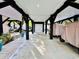 Covered patio with golf cart, providing extra parking and storage at 6001 - 1191 S Kings Hwy., Myrtle Beach, SC 29575