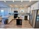 Well-equipped kitchen boasting granite countertops and white cabinets at 6001 - 1191 S Kings Hwy., Myrtle Beach, SC 29575