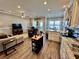 Open concept kitchen and living area with hardwood floors at 6001 - 1191 S Kings Hwy., Myrtle Beach, SC 29575