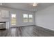 Bright dining area with hardwood floors and access to the backyard at 114 Arrow Wood Dr, Conway, SC 29526