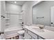 Clean bathroom with a bathtub, shower, and vanity with a quartz countertop at 219 Sundrop Way, Conway, SC 29526