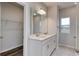 Double vanity bathroom with walk-in shower and closet at 219 Sundrop Way, Conway, SC 29526