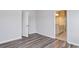 Bright bedroom with hardwood floors and access to bathroom at 219 Sundrop Way, Conway, SC 29526