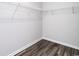 Spacious walk-in closet with wire shelving and wood-look flooring at 219 Sundrop Way, Conway, SC 29526