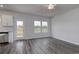 Bright dining area with hardwood floors and access to patio at 219 Sundrop Way, Conway, SC 29526