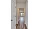 Bright hallway with wood-look floors and access to other rooms at 219 Sundrop Way, Conway, SC 29526