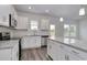 Spacious kitchen with granite countertops and island at 219 Sundrop Way, Conway, SC 29526