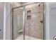Walk-in shower with tiled walls and built-in seat at 219 Sundrop Way, Conway, SC 29526