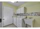 Laundry room with washer, dryer, utility sink, and cabinets at 4542 Mandi Ave., Little River, SC 29566