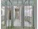 Bathroom with double sinks, shower, and mirrored closets at 4542 Mandi Ave., Little River, SC 29566