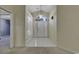 Bright entryway with tiled floor and arched window at 4542 Mandi Ave., Little River, SC 29566
