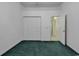 Spacious bedroom with ample closet space and green carpeting at 4542 Mandi Ave., Little River, SC 29566