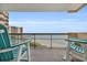 Spacious balcony with ocean views and comfortable seating at 8500 Margate Circle # 1104, Myrtle Beach, SC 29572