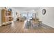 Bright dining area with wood floors and coastal decor at 8500 Margate Circle # 1104, Myrtle Beach, SC 29572