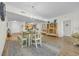 Open dining area with a view into the kitchen and living room at 8500 Margate Circle # 1104, Myrtle Beach, SC 29572