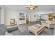Open living room with coastal decor and view to dining area at 8500 Margate Circle # 1104, Myrtle Beach, SC 29572