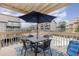 Private balcony with table and chairs, overlooking the pool at 9661 Shore Dr. # B30, Myrtle Beach, SC 29572