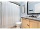 Bathroom with tub shower combination, vanity, and toilet at 9661 Shore Dr. # B30, Myrtle Beach, SC 29572
