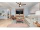 Living room with a large TV, comfy seating, and a neutral color scheme at 9661 Shore Dr. # B30, Myrtle Beach, SC 29572