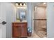 Clean bathroom with a walk-in shower and updated vanity at 9661 Shore Dr. # B30, Myrtle Beach, SC 29572