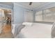 Comfortable bedroom with a queen-size bed and access to the kitchen at 9661 Shore Dr. # B30, Myrtle Beach, SC 29572