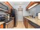 Modern kitchen with stainless steel appliances and granite countertops at 9661 Shore Dr. # B30, Myrtle Beach, SC 29572