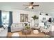 Open living room featuring neutral tones and ample natural light at 204 Sundrop Way, Conway, SC 29526