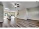 Spacious living area with hardwood floors and kitchen island view at 204 Sundrop Way, Conway, SC 29526