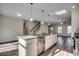 Modern kitchen island with granite countertop and stainless steel dishwasher at 204 Sundrop Way, Conway, SC 29526
