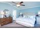 Spacious bedroom with light blue walls and a king-size bed at 204 Sundrop Way, Conway, SC 29526