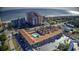 Aerial view of St. John's Inn, pool, parking, and beach at 6803 N Ocean Blvd. # 217, Myrtle Beach, SC 29572