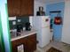 Small kitchenette with appliances, sink, and storage at 6803 N Ocean Blvd. # 217, Myrtle Beach, SC 29572
