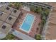 Aerial view of the community pool with lounge chairs and umbrellas at 6803 N Ocean Blvd. # 217, Myrtle Beach, SC 29572
