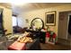 Bedroom with unmade bed, dresser, and mirror at 106 & 108 Jones St., Mullins, SC 29574