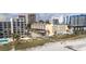 Aerial view of oceanfront condo building and surrounding area at 202 75Th Ave N # 5702/5703, Myrtle Beach, SC 29572