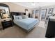 Bright bedroom featuring a king-size bed and ocean views at 202 75Th Ave N # 5702/5703, Myrtle Beach, SC 29572
