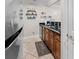 Kitchen with dark wood cabinets and granite countertops at 202 75Th Ave N # 5702/5703, Myrtle Beach, SC 29572