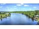 Aerial view of waterfront property with lush greenery at 3723 Choppee Rd., Georgetown, SC 29440