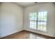 Spacious bedroom with hardwood floors and a large window at 3723 Choppee Rd., Georgetown, SC 29440