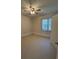 Simple bedroom with a window, ceiling fan and neutral walls at 3723 Choppee Rd., Georgetown, SC 29440