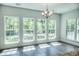 Bright dining room with hardwood floors and large windows at 3723 Choppee Rd., Georgetown, SC 29440