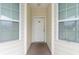 Building entryway with white door and hallway at 4930 Crab Pond Ct. # 2-202, Myrtle Beach, SC 29579