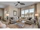 Cozy living room featuring a large sectional sofa and expansive windows at 5451 Shelly Lynn Dr., Myrtle Beach, SC 29579