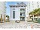 Three-story building with balconies and ocean views at 6244 Catalina Dr. # 4303, North Myrtle Beach, SC 29582