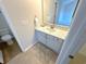 Bathroom with vanity, toilet, and shower/tub combo at 107 Pawleys Place Dr. # 107, Litchfield, SC 29585