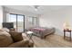 Bedroom with balcony access and partial ocean view at 1100 Possum Trot Rd. # F-213, North Myrtle Beach, SC 29582
