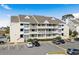 Attractive condo building with ample parking at 1100 Possum Trot Rd. # F-213, North Myrtle Beach, SC 29582